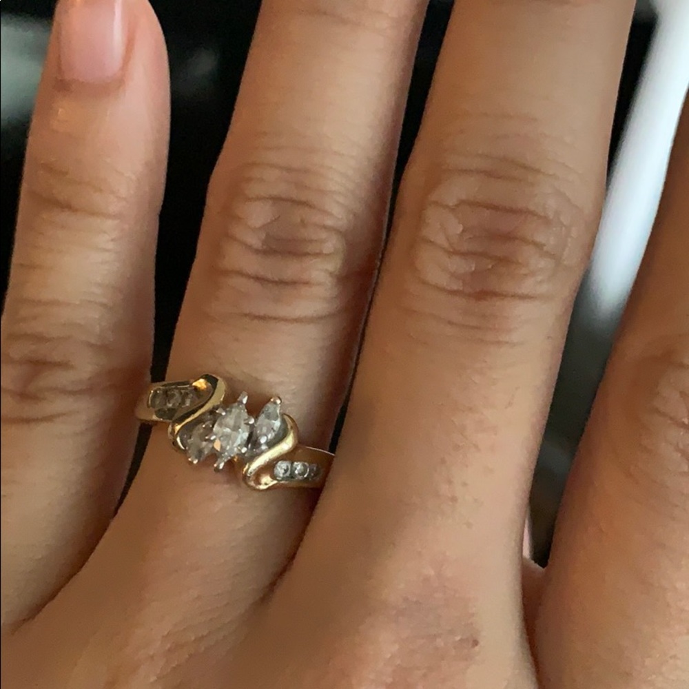 Real diamond ring with 14 karat yellow gold